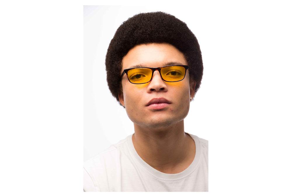 Man Wearing Tortoise Shell Light Sensitivity Glasses